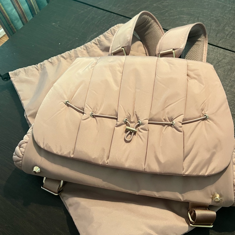 Brand new pink Happ diaper bag